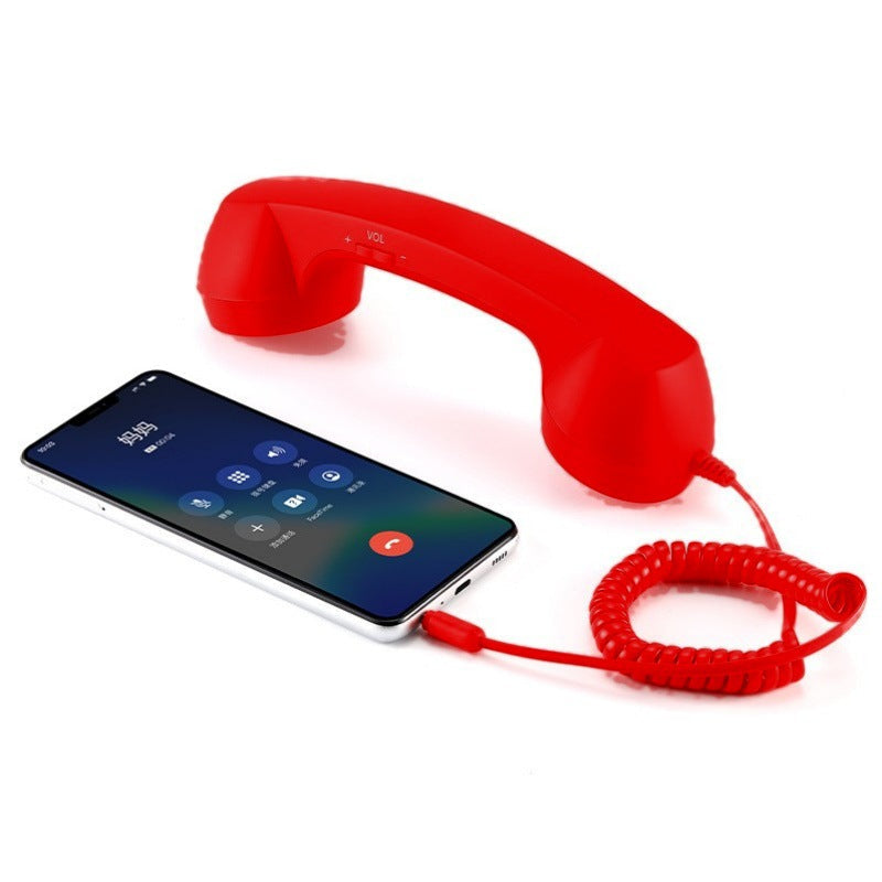 HD Wired In Ear Headphones connected to a smartphone with a red vintage-style handset.