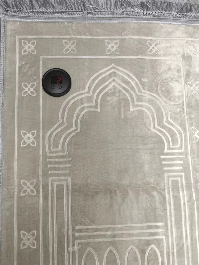 The Digital Sajda Counter showing a clear digital layout on its screen, a premium smart salah rakat tracker and daily dhikr magnet accessory.
