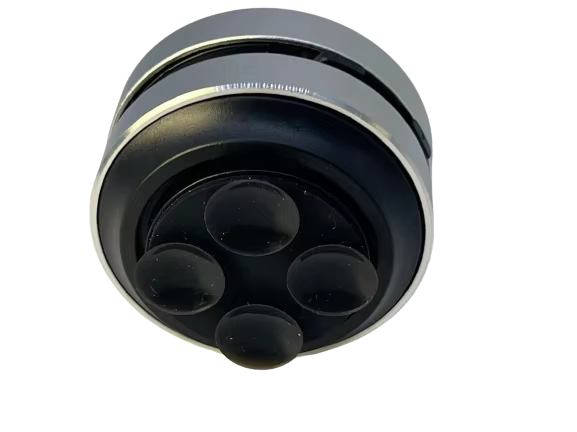 Sonic Puck Mini speakers showcasing the sleek design and four contact points for enhanced sound delivery.