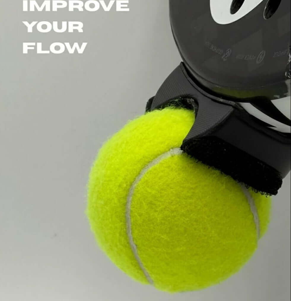 The PadelGrab attached to a racket, highlighting the innovative design for easier ball pickup.