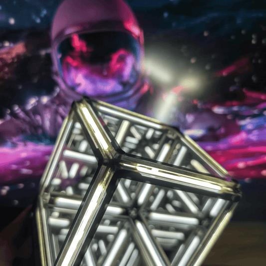 Interstellar Cube infinity mirror lamp glowing on a bedside table