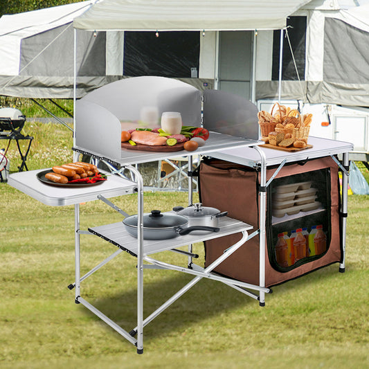 Portable Camping Kitchen Table with integrated storage cabinets, folding side tables, and reinforced aluminum frame.