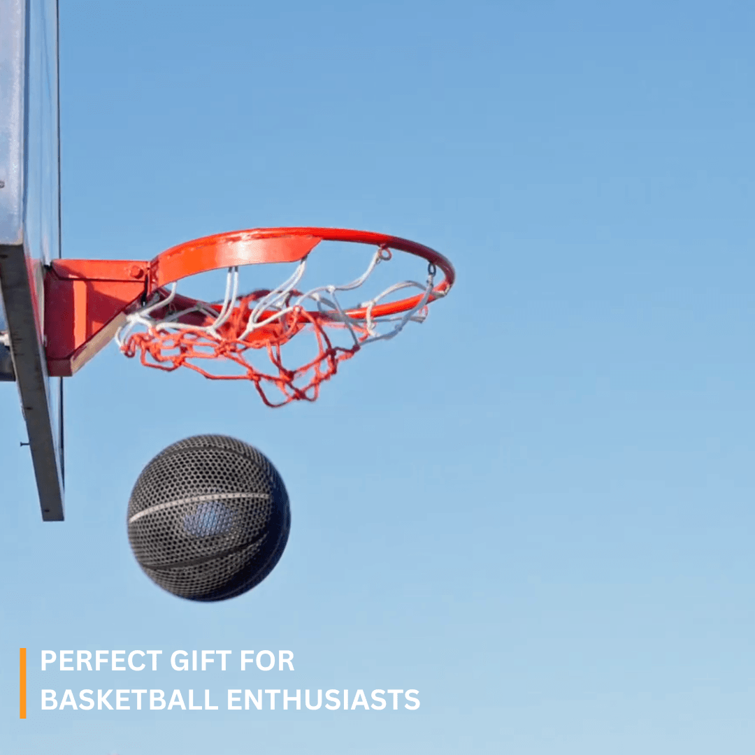 3D printed airless basketball making a shot at the hoop, perfect gift for basketball enthusiasts.