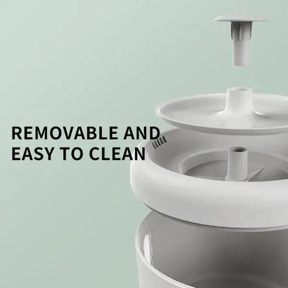 A white Silent Circular Pet Water Fountain showcasing the flowing water stream and compact, modern circular design.