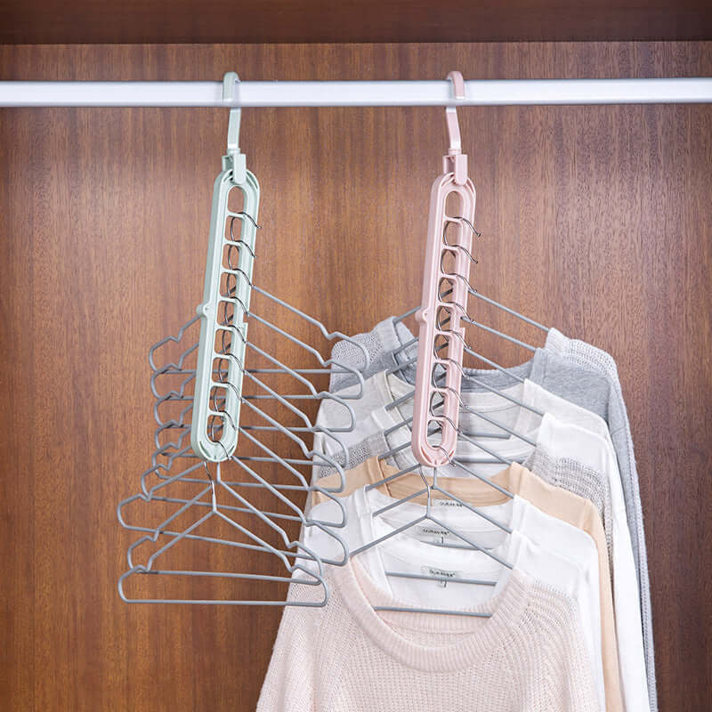9-Hole Space-Saving Magic Hangers in a set of 2, demonstrating vertical and horizontal storage modes in a modern closet.