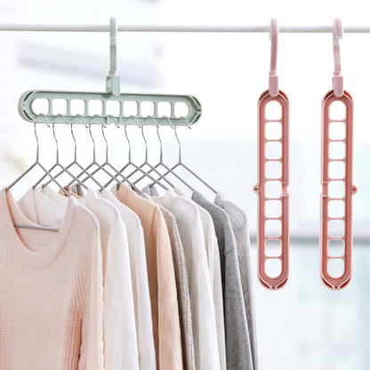 9-Hole Space-Saving Magic Hangers in a set of 2, demonstrating vertical and horizontal storage modes in a modern closet.