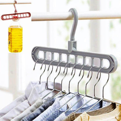 9-Hole Space-Saving Magic Hangers in a set of 2, demonstrating vertical and horizontal storage modes in a modern closet.