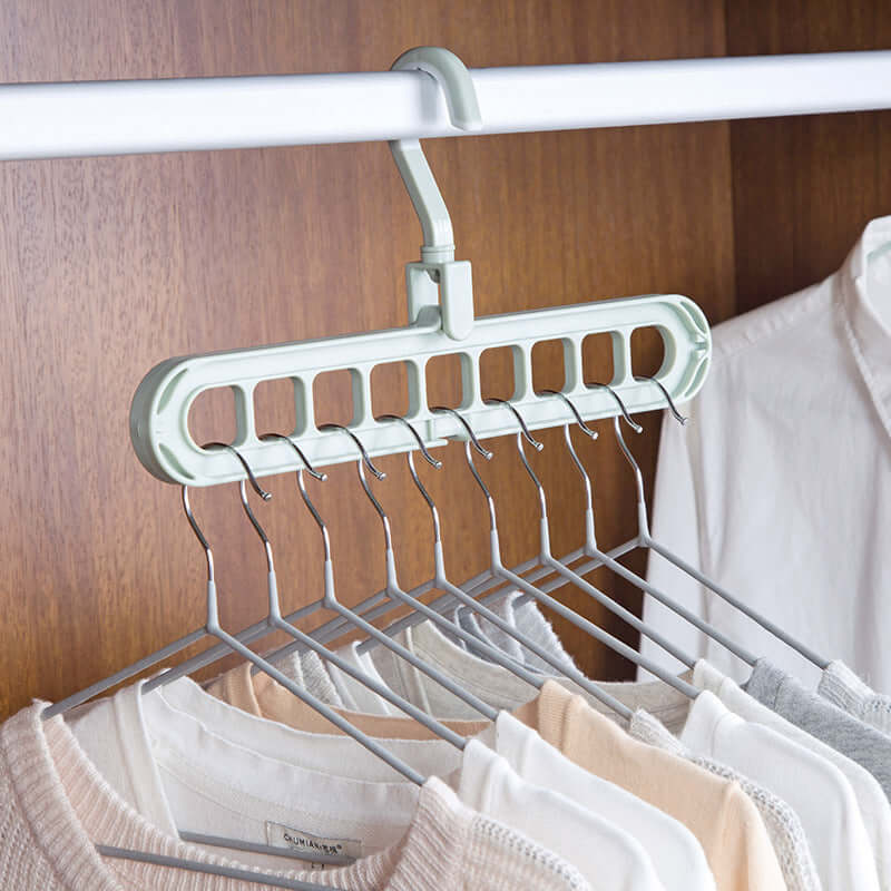 9-Hole Space-Saving Magic Hangers in a set of 2, demonstrating vertical and horizontal storage modes in a modern closet.