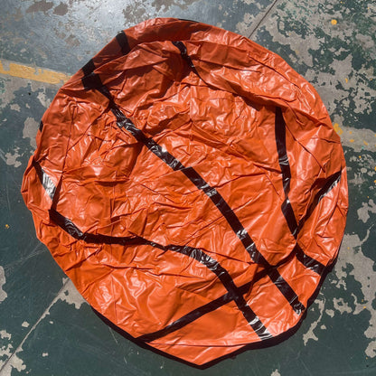 an Inflatable Basketball Sofa, in court side