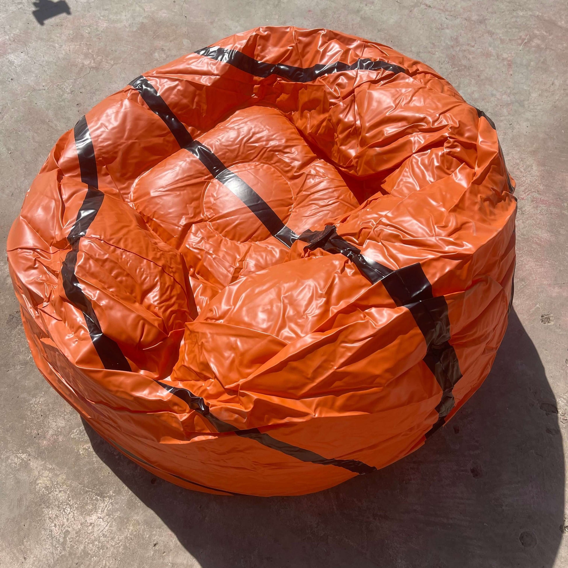 an Inflatable Basketball Sofa, in court side