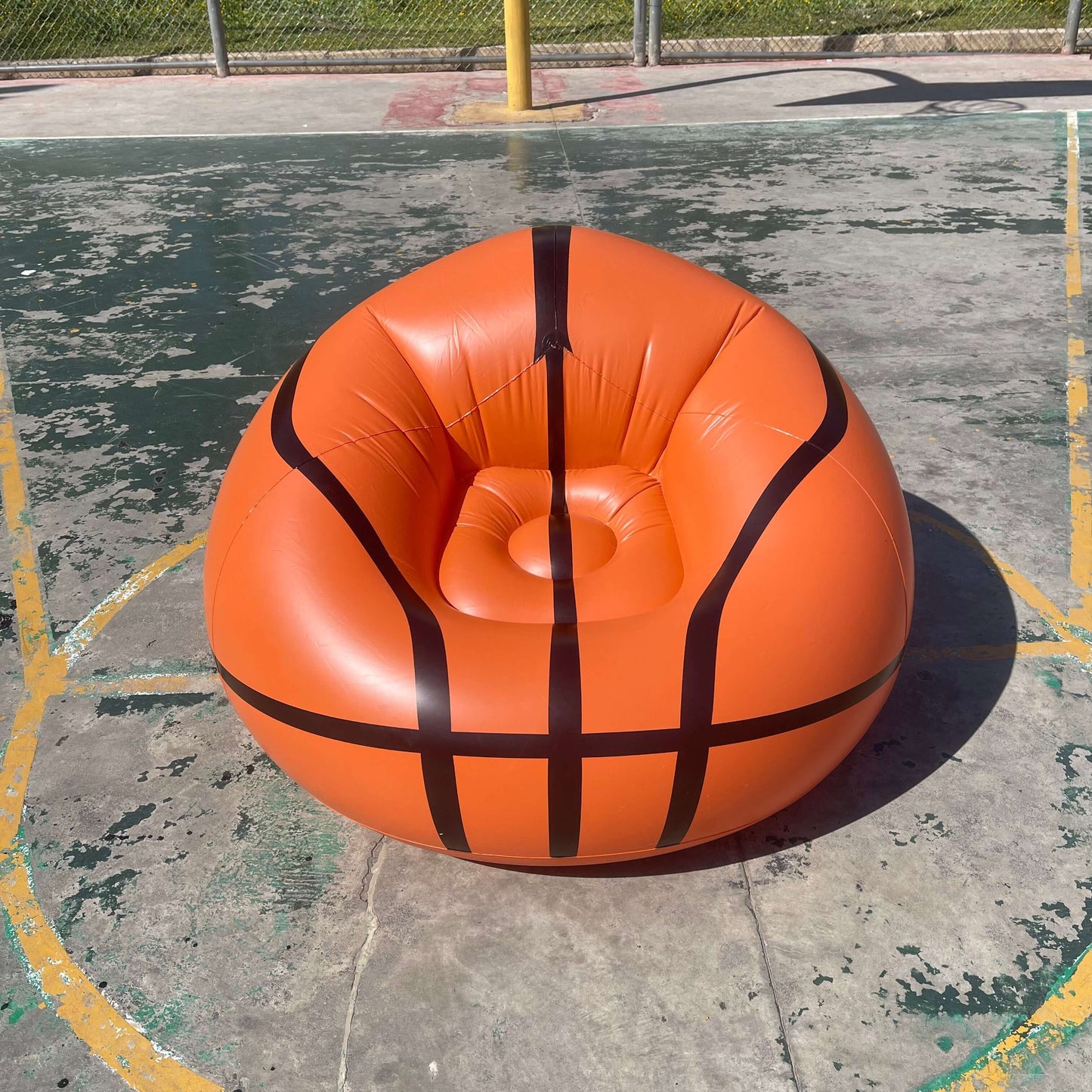 an Inflatable Basketball Sofa, in court side