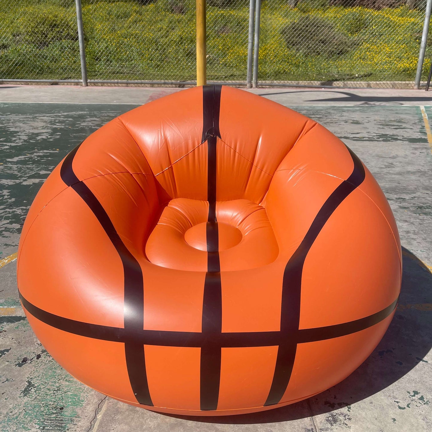 an Inflatable Basketball Sofa, in court side