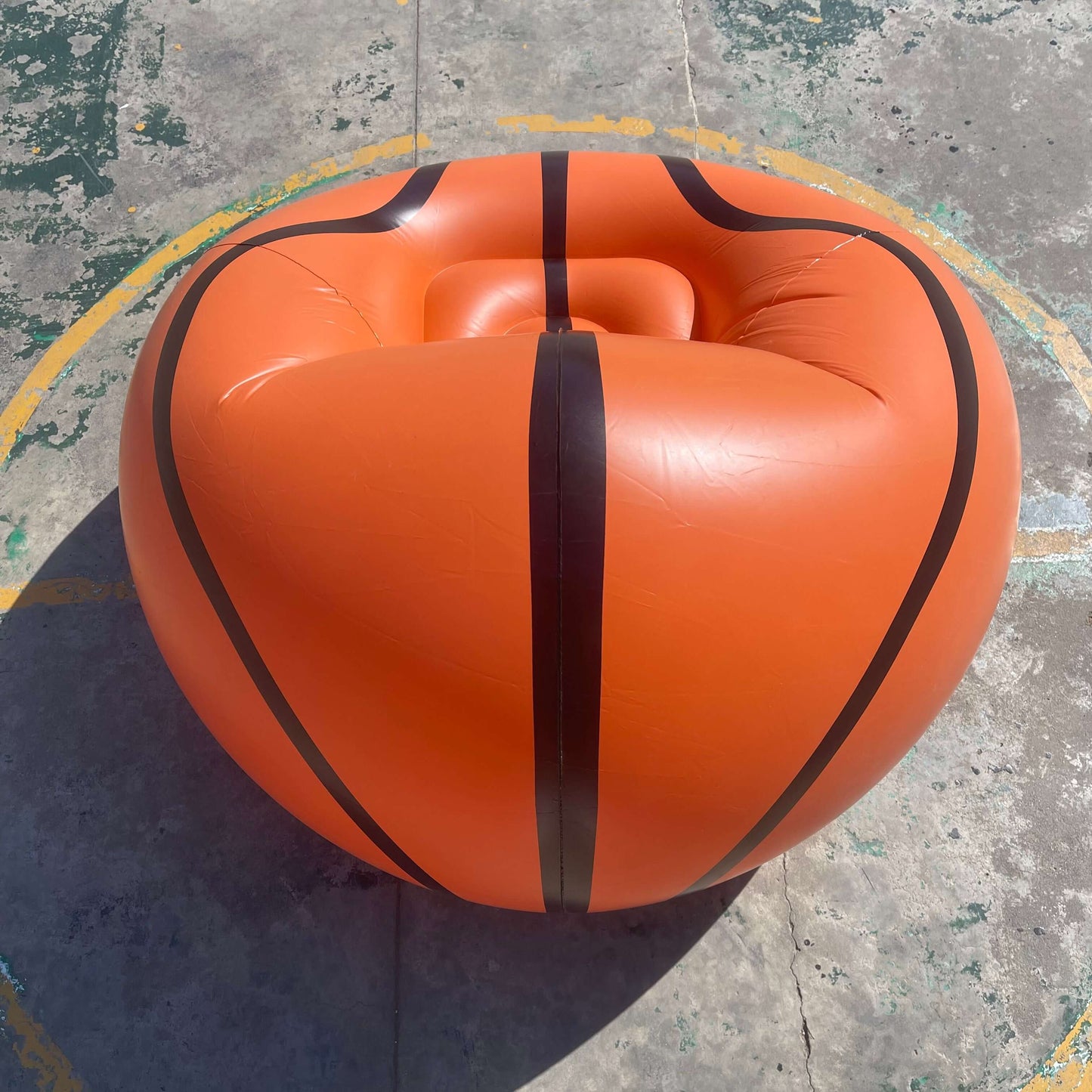 an Inflatable Basketball Sofa, in court side
