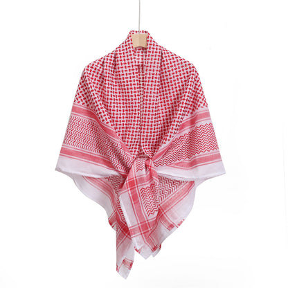 Detailed storefront display of the AL-SULTAN traditional red white shemagh scarf, showcasing the intricate jacquard wave-pattern textures and precision woven geometric border detailing.