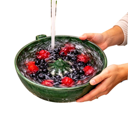 Berry Vortex Washing Bowl with fresh berries being rinsed under running water