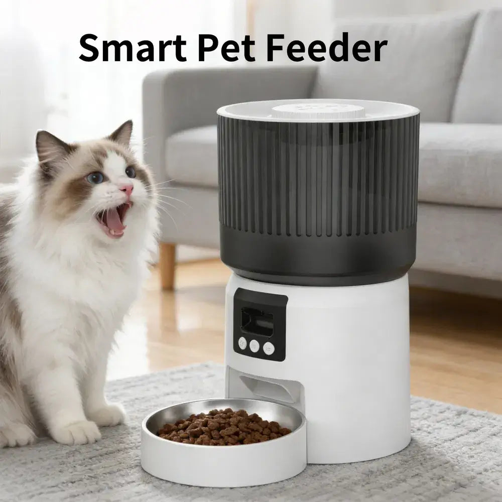 Smart Precision Pet Feeder in a minimalist white finish, showcasing the automated food dispensing tray and digital interface.
