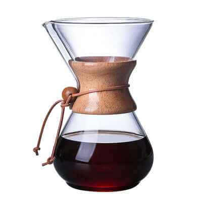 Chemex Coffee Maker showcasing premium glass design with wooden accent and freshly brewed coffee inside.