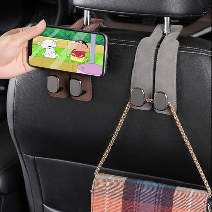 Double Hook Car Seat Hanger holding a phone and handbag on a car seat for organized storage and convenience.