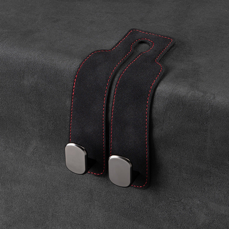 Double Hook Car Seat Hanger with luxury leather design and twin hooks for car interior organization.