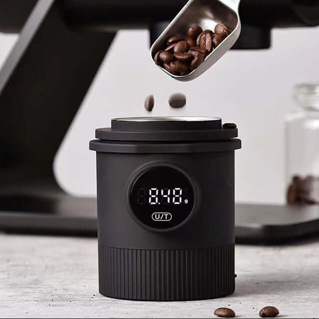 High Precision Coffee Scale showcasing a black powder cup with stainless steel inner liner and coffee beans being measured.