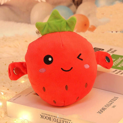 Human-Sensing Interactive Plush Toy - cute strawberry plush toy with smiling face and green leaves.