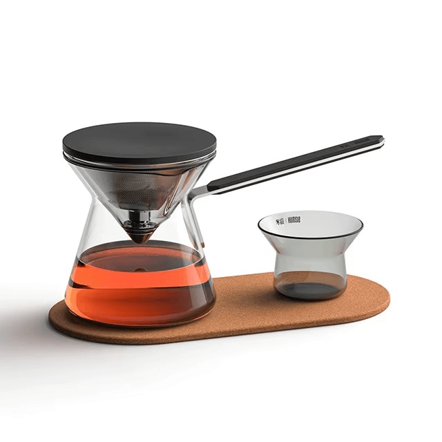 Magnetic Tea Pot - Chroma Glass Press-Type Infuser brewing tea with clear glass design and black accents.