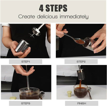 A stainless steel Portable Press Coffee Infuser stick filtering coffee grounds inside a ceramic travel mug.