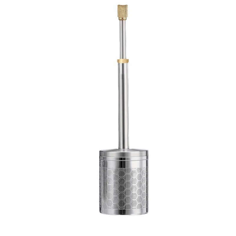 A stainless steel Portable Press Coffee Infuser stick filtering coffee grounds inside a ceramic travel mug.