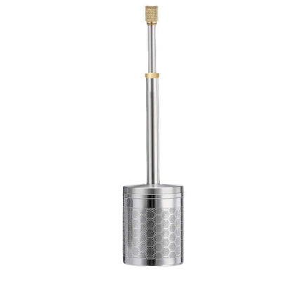 A stainless steel Portable Press Coffee Infuser stick filtering coffee grounds inside a ceramic travel mug.