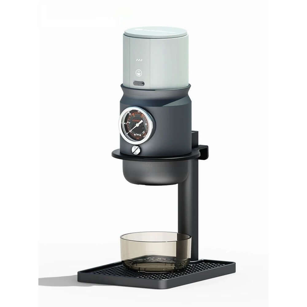 Portable Espresso Maker with an all-metal body, featuring a pressure gauge and cup holder for brewing espresso.