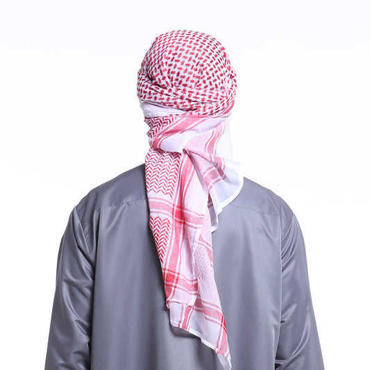 Detailed storefront display of the AL-SULTAN traditional red white shemagh scarf, showcasing the intricate jacquard wave-pattern textures and precision woven geometric border detailing.
