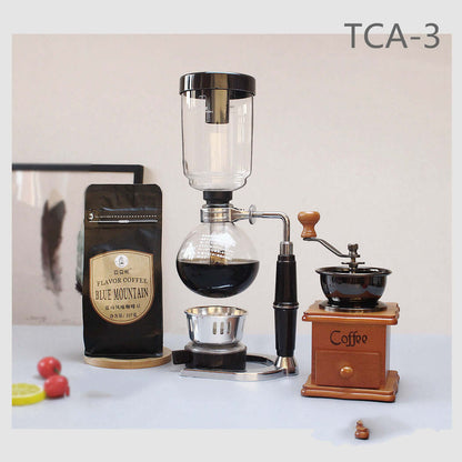 Premium Siphon Coffee Maker with TCA vacuum design and coffee grinder, ideal for artisanal brewing.