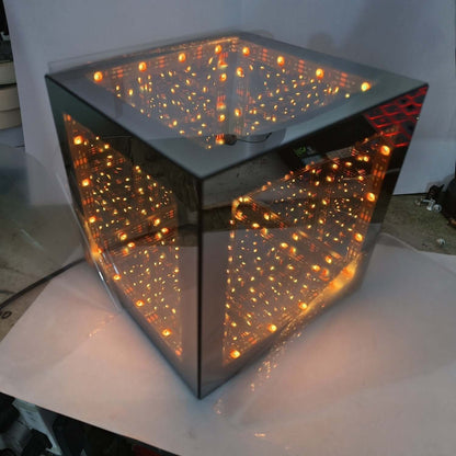Tesseract Abyss Lamp – Infinity Mirror Hypercube Desktop Light showcasing geometric LED illusion cube and infinity mirror tunnel light.