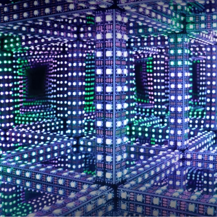 Tesseract Abyss Lamp displaying colorful, infinite mirror light patterns with geometric reflections.
