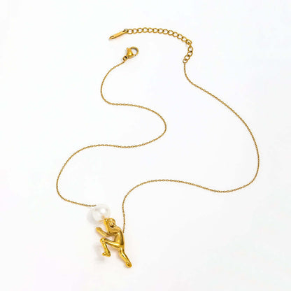 The Ambition Pearl Necklace featuring a sculpted figure and centerpiece pearl, symbolizing strength and persistence.