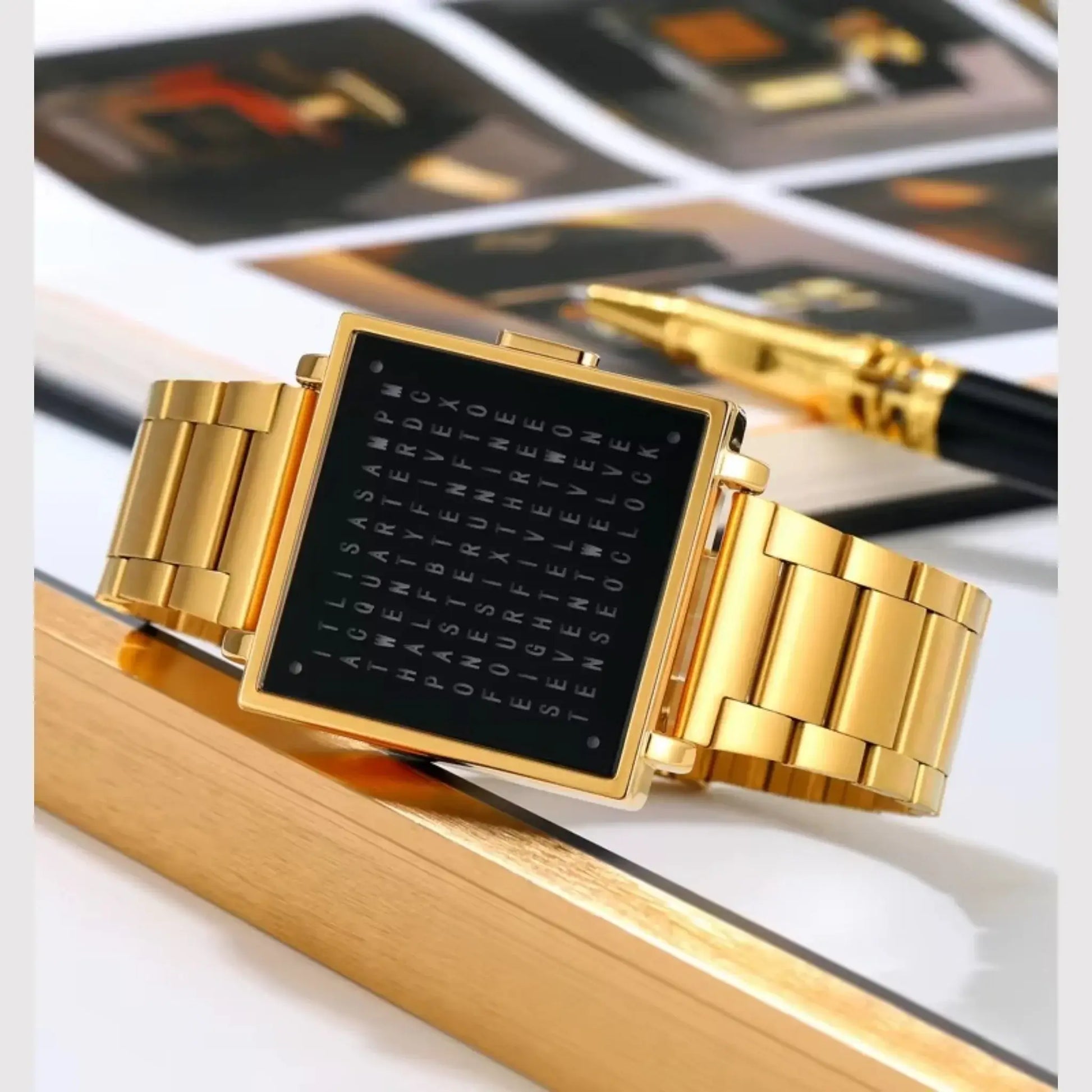 Retro digital watch with a square black dial and gold stainless steel bracelet.