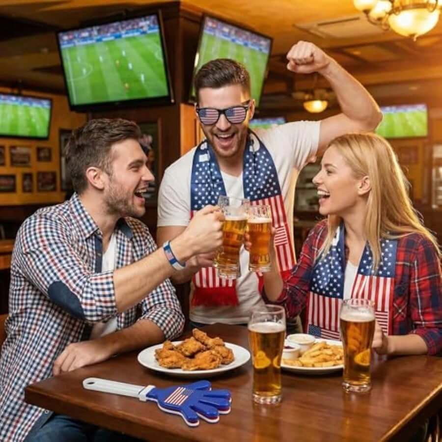 USA world cup fan kit celebration with friends in a sports bar enjoying food and drinks.