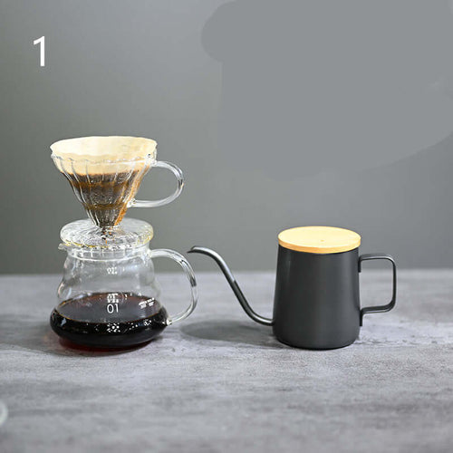 Pour Over Coffee Maker Set with V60 Dripper and kettle on a countertop, perfect for home brewing.